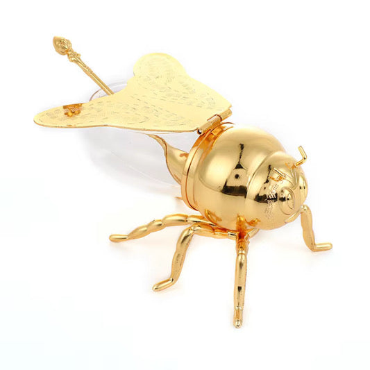 Recipiente abeja dorado con cuchara
