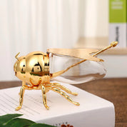 Recipiente abeja dorado con cuchara