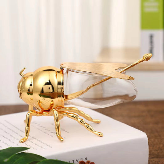 Recipiente abeja dorado con cuchara