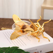 Recipiente abeja dorado con cuchara