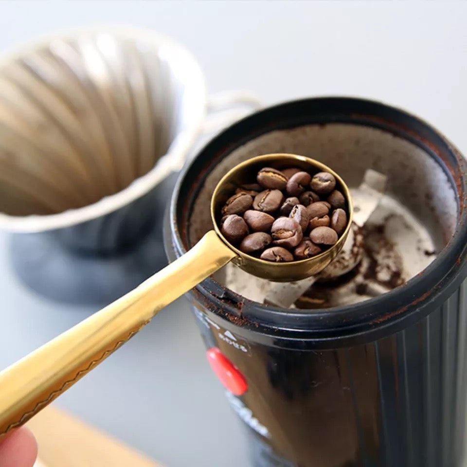 Cuchara clip sellador para cafe dorado