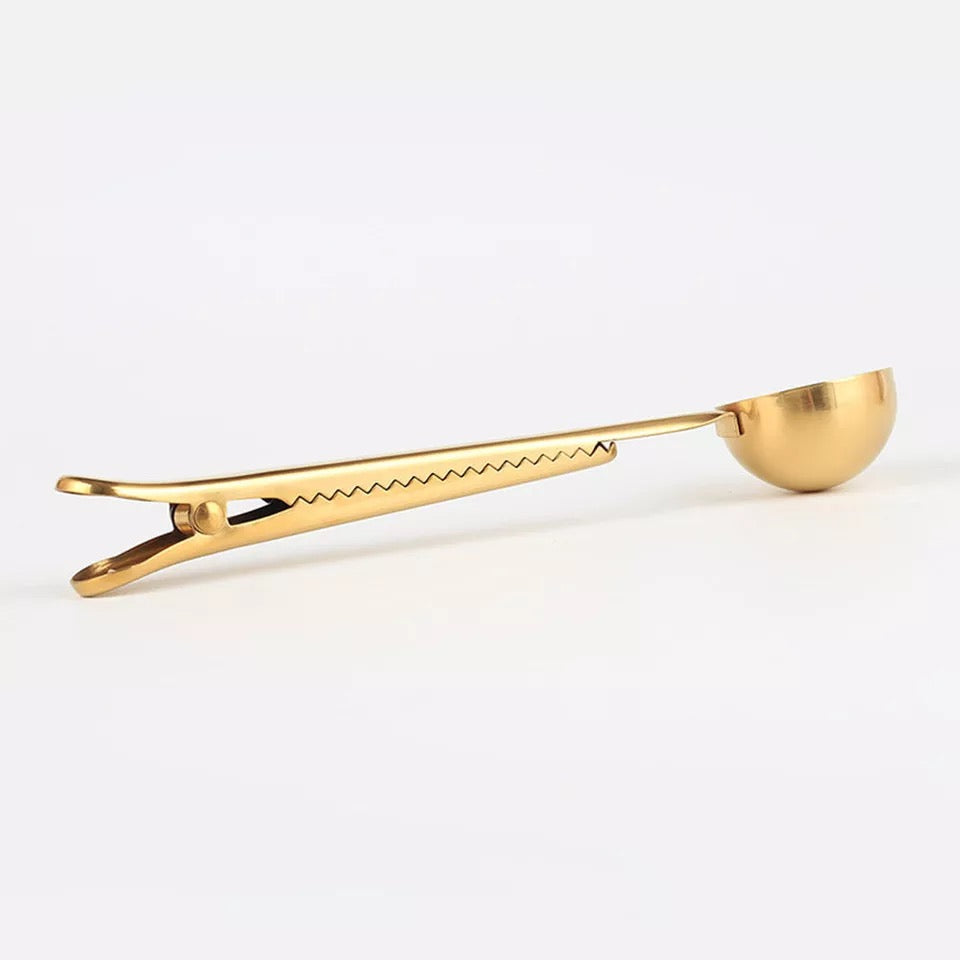 Cuchara clip sellador para cafe dorado